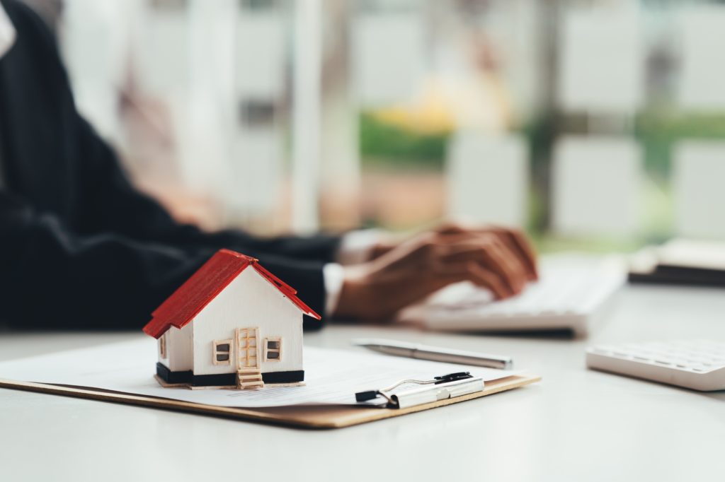 Model homes and real estate agents for sale of a home during insurance or on a real estate loan or p