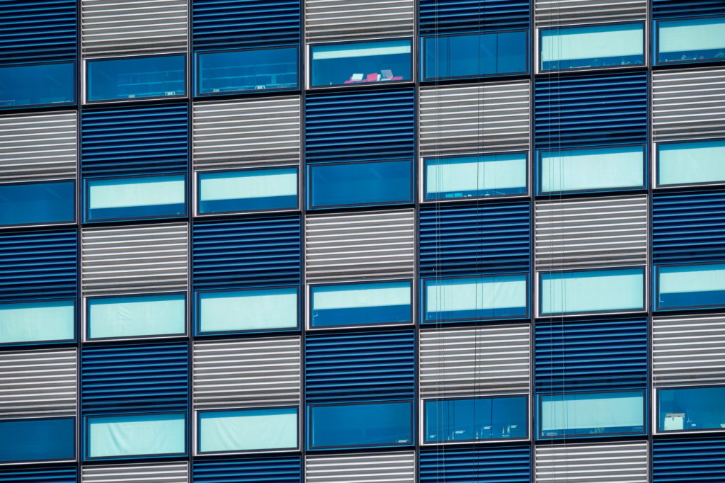 Modern building facade with widnows close up